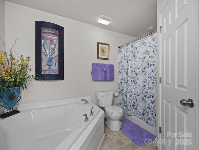 full bath featuring a relaxing tiled tub, a textured ceiling, a shower with shower curtain, and toilet