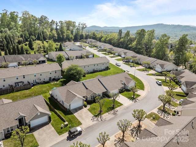 birds eye view of property with a residential view and a mountain view