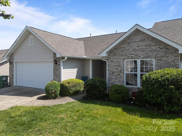 ranch-style home featuring brick siding, a shingled roof, a garage, and driveway
