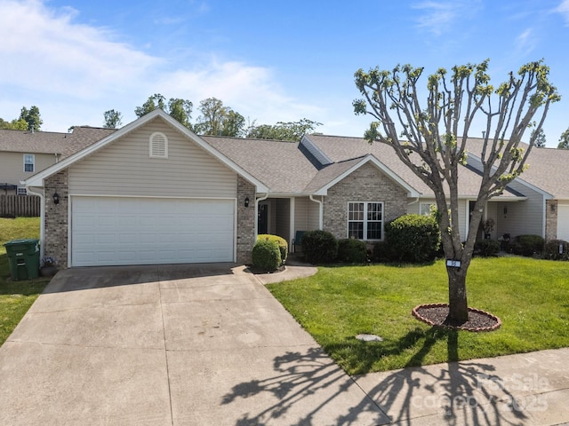single story home featuring a front yard, roof with shingles, brick siding, concrete driveway, and an attached garage