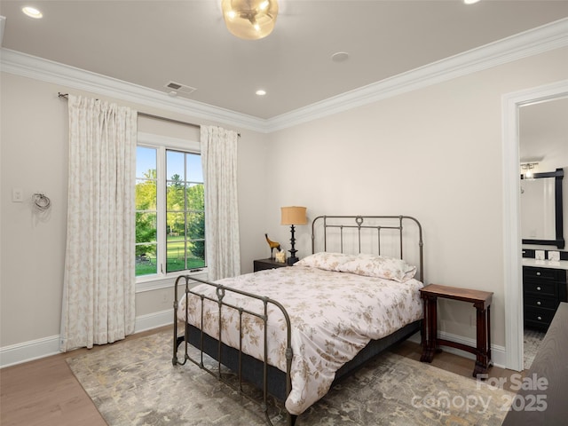 41 Bear Flower Trl, Arden, NC 28704 - bedroom with crown molding, wood finished floors, baseboards, and recessed lighting