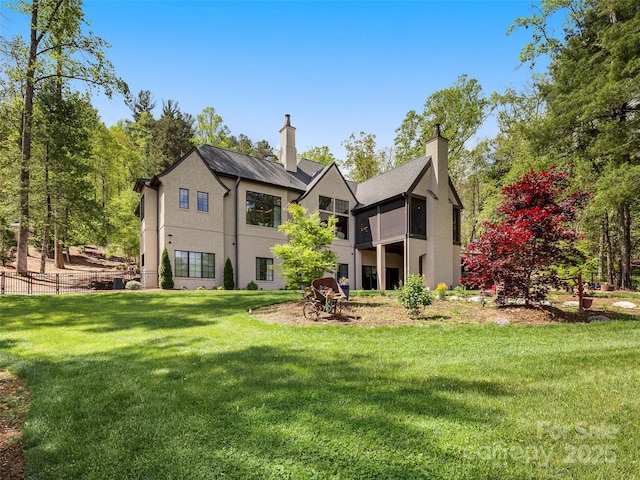 41 Bear Flower Trl, Arden, NC 28704 - back of property featuring stucco siding and a chimney