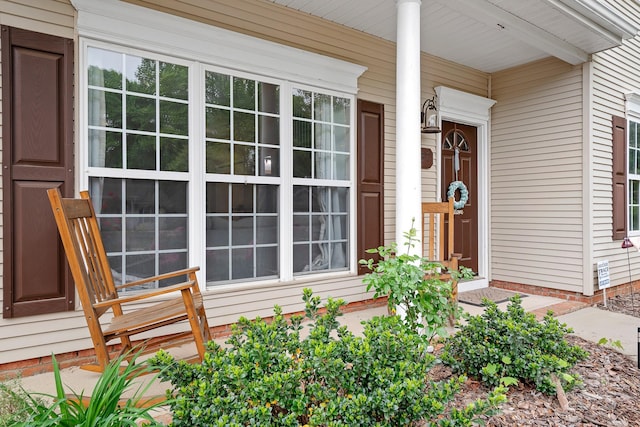 property entrance with a porch