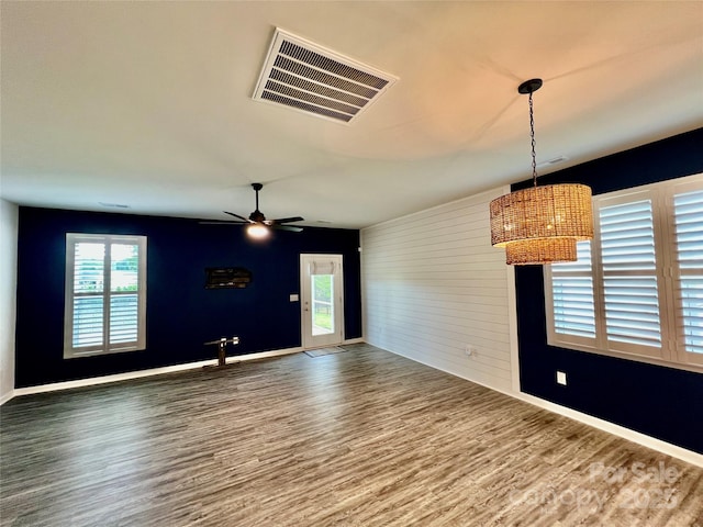 3619 Whitney Way, Terrell, NC 28682 - unfurnished dining area with ceiling fan, a wealth of natural light, wood finished floors, and visible vents