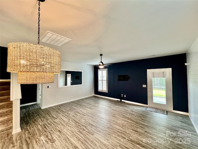 3619 Whitney Way, Terrell, NC 28682 - unfurnished living room with baseboards, a ceiling fan, and wood finished floors