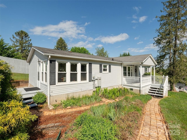view of front of home with a wooden deck