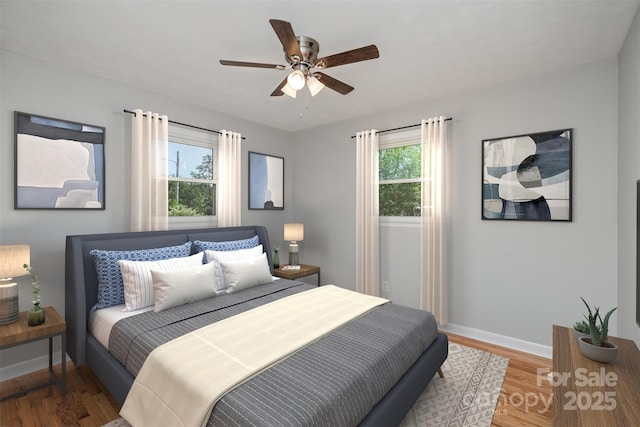 bedroom with wood finished floors, baseboards, and a ceiling fan