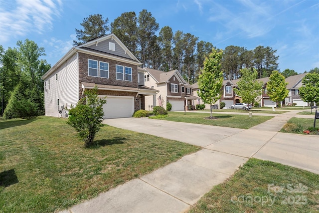 view of front of property featuring concrete driveway, brick siding, a front lawn, and a garage