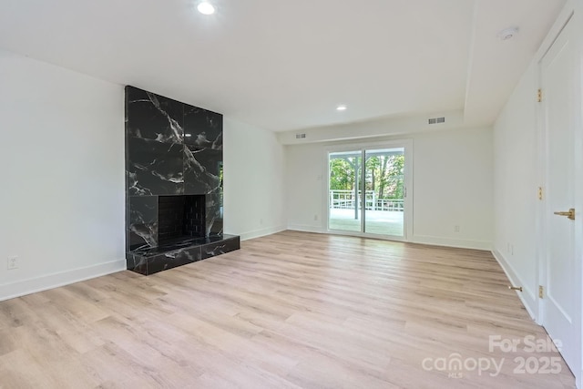 200 Kimrod Ln, Charlotte, NC 28270 - unfurnished living room with wood finished floors, recessed lighting, a fireplace, and baseboards