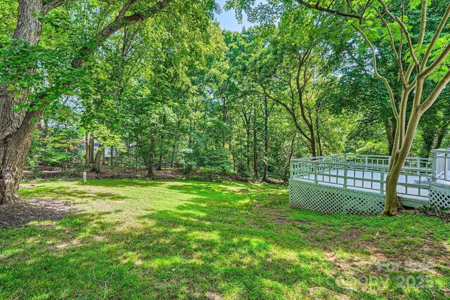 200 Kimrod Ln, Charlotte, NC 28270 - view of grassy yard featuring a wooden deck