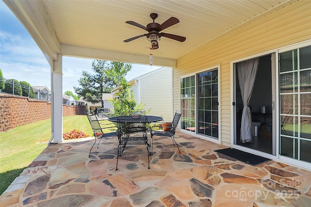 18020 Owl Ct, Indian Land, SC 29707 - view of patio / terrace with fence, a ceiling fan, and outdoor dining area