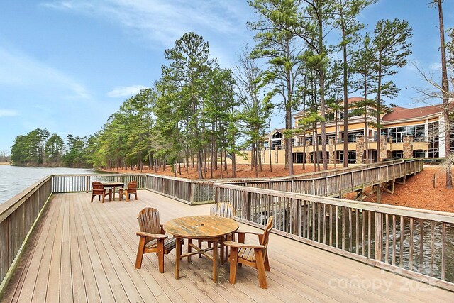 18020 Owl Ct, Indian Land, SC 29707 - wooden deck with a water view and outdoor dining area