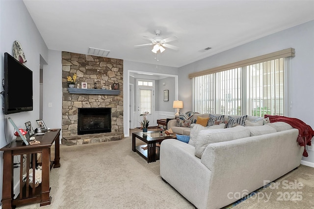 18020 Owl Ct, Indian Land, SC 29707 - carpeted living area featuring ceiling fan, visible vents, and a stone fireplace