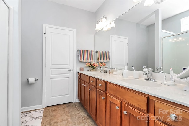 18020 Owl Ct, Indian Land, SC 29707 - full bathroom featuring double vanity, a sink, baseboards, and a stall shower