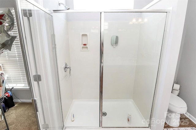 18020 Owl Ct, Indian Land, SC 29707 - bathroom with baseboards, toilet, and a shower stall