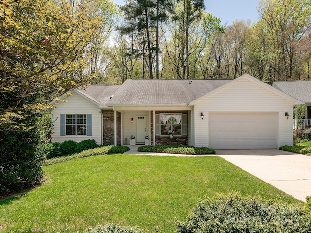 single story home featuring a front yard, an attached garage, concrete driveway, and roof with shingles