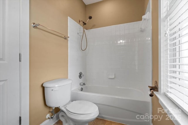 full bath with toilet and shower / bath combination