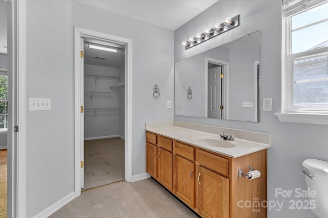1218 Faversham Ln, Rock Hill, SC 29730 - bathroom featuring vanity and a walk in closet