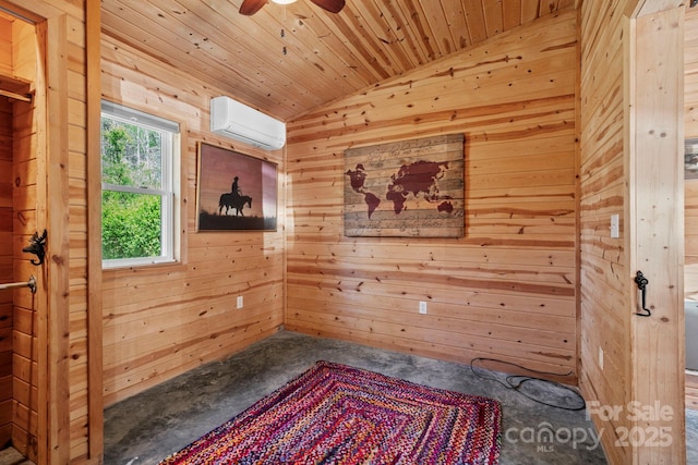interior space with wooden ceiling, concrete floors, wood walls, an AC wall unit, and lofted ceiling