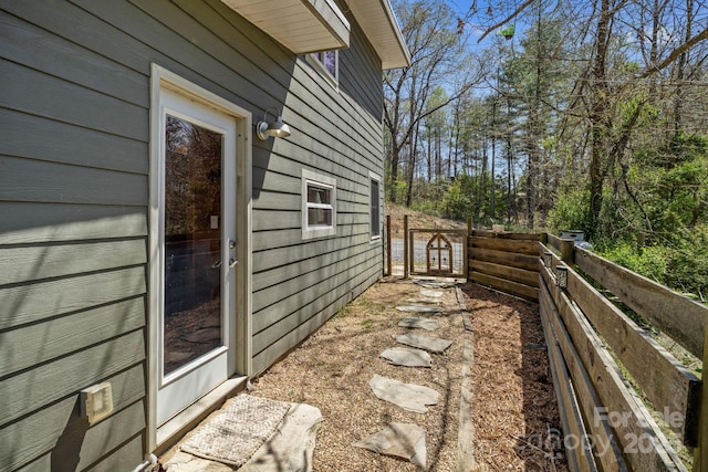 view of property exterior with fence
