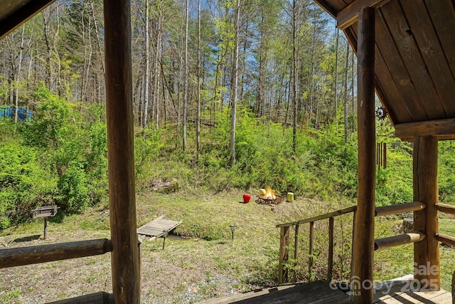 view of yard with a wooded view