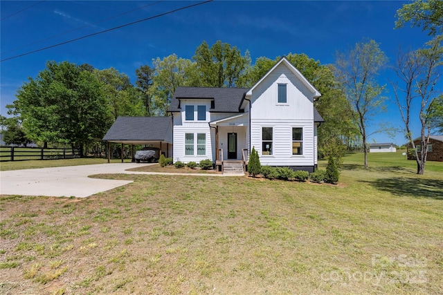 5028 Lewis Rd, Gastonia, NC 28052 - view of front of property with board and batten siding, concrete driveway, and a carport