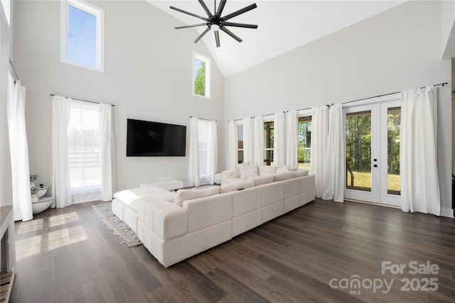 5028 Lewis Rd, Gastonia, NC 28052 - living area featuring high vaulted ceiling, french doors, a ceiling fan, and dark wood-type flooring