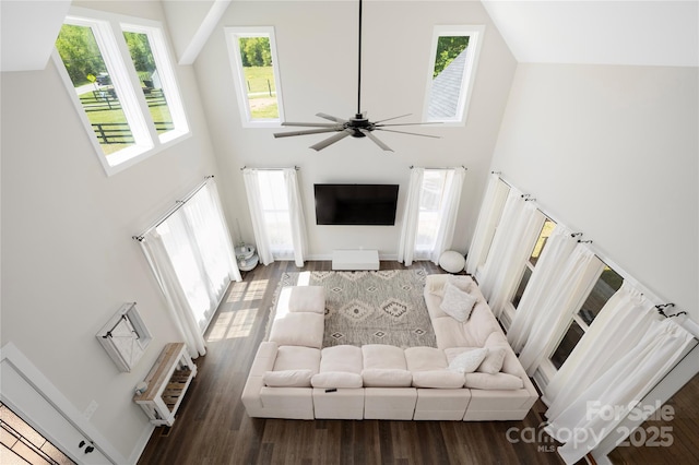 5028 Lewis Rd, Gastonia, NC 28052 - living room featuring a high ceiling, wood finished floors, and a ceiling fan