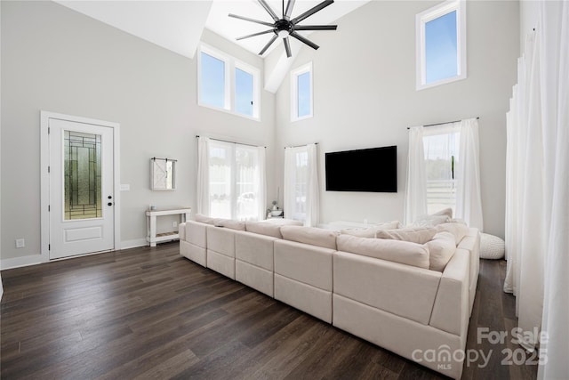 5028 Lewis Rd, Gastonia, NC 28052 - living area with a towering ceiling, dark wood finished floors, ceiling fan, and baseboards