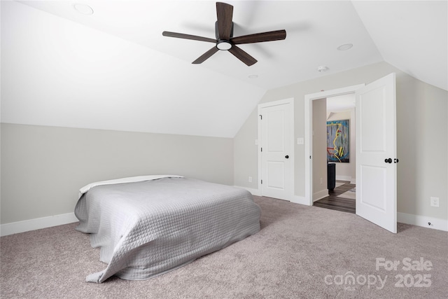 5028 Lewis Rd, Gastonia, NC 28052 - carpeted bedroom with vaulted ceiling, ceiling fan, and baseboards