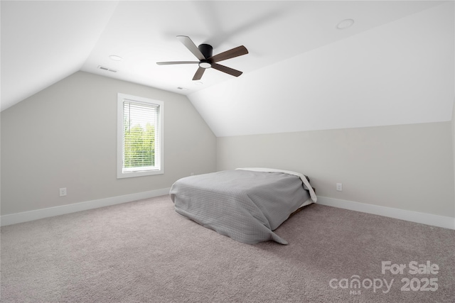 5028 Lewis Rd, Gastonia, NC 28052 - carpeted bedroom with lofted ceiling, baseboards, and a ceiling fan