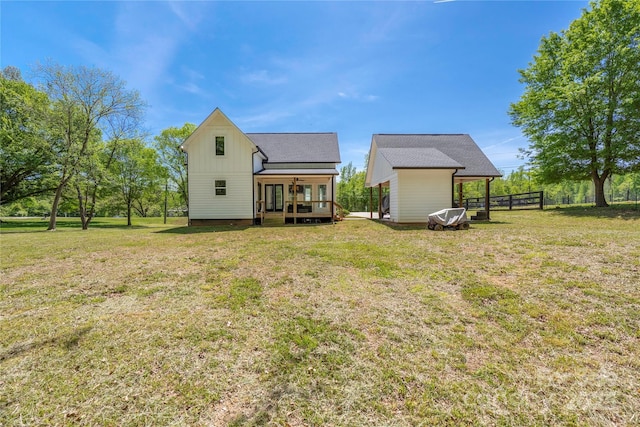 5028 Lewis Rd, Gastonia, NC 28052 - back of property with a wooden deck and board and batten siding