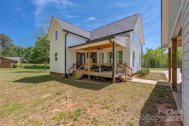 5028 Lewis Rd, Gastonia, NC 28052 - back of property featuring ceiling fan, a lawn, roof with shingles, and board and batten siding