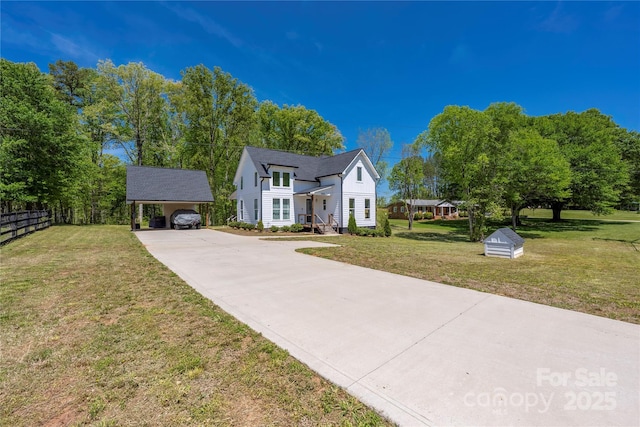 5028 Lewis Rd, Gastonia, NC 28052 - view of front of house featuring a carport and driveway