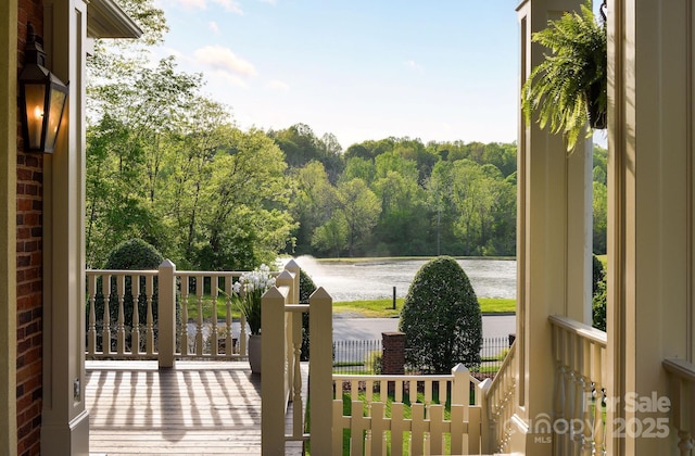 4324 Doverstone Ln, Greensboro, NC 27407 - deck with a water view and a porch