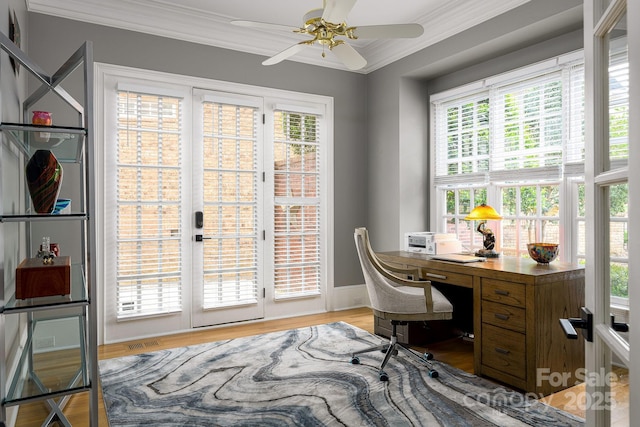 4324 Doverstone Ln, Greensboro, NC 27407 - home office featuring crown molding, visible vents, wood finished floors, baseboards, and ceiling fan