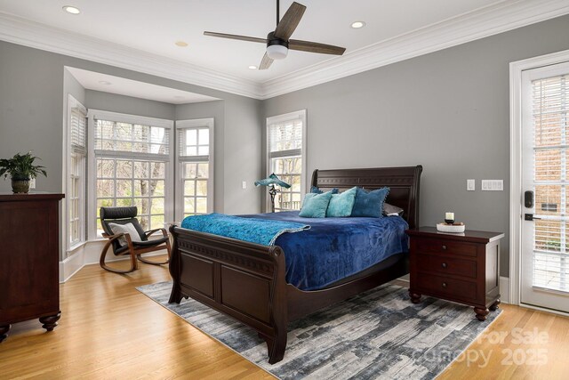 4324 Doverstone Ln, Greensboro, NC 27407 - bedroom featuring crown molding, recessed lighting, wood finished floors, and multiple windows