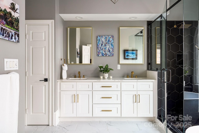 4324 Doverstone Ln, Greensboro, NC 27407 - full bathroom featuring double vanity, a sink, marble finish floor, and a stall shower