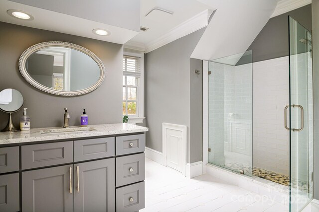 4324 Doverstone Ln, Greensboro, NC 27407 - full bath with a shower stall, vanity, baseboards, ornamental molding, and recessed lighting