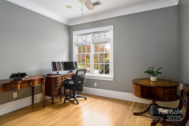 4324 Doverstone Ln, Greensboro, NC 27407 - office area featuring ceiling fan, visible vents, crown molding, wood finished floors, and baseboards