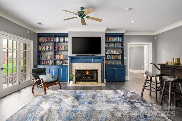 4324 Doverstone Ln, Greensboro, NC 27407 - living room featuring crown molding, recessed lighting, wood finished floors, and a fireplace