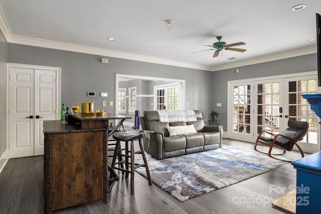4324 Doverstone Ln, Greensboro, NC 27407 - living area with crown molding, ceiling fan, french doors, and dark wood-type flooring