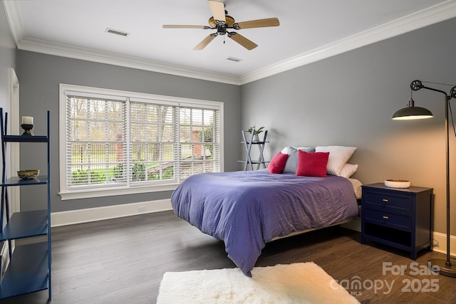 4324 Doverstone Ln, Greensboro, NC 27407 - bedroom featuring multiple windows, ornamental molding, and wood finished floors
