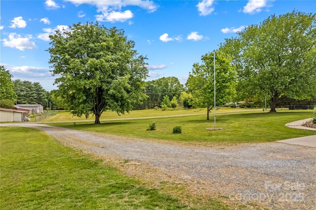 surrounding community with a lawn