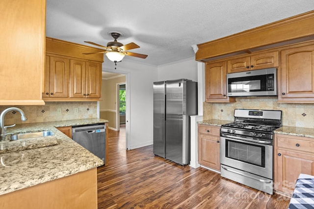 101 Wynnchester Rd, Gastonia, NC 28056 - kitchen featuring ceiling fan, appliances with stainless steel finishes, a sink, ornamental molding, and dark wood-type flooring
