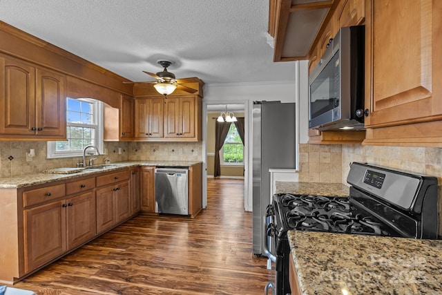 101 Wynnchester Rd, Gastonia, NC 28056 - kitchen with ceiling fan, appliances with stainless steel finishes, plenty of natural light, and dark wood finished floors