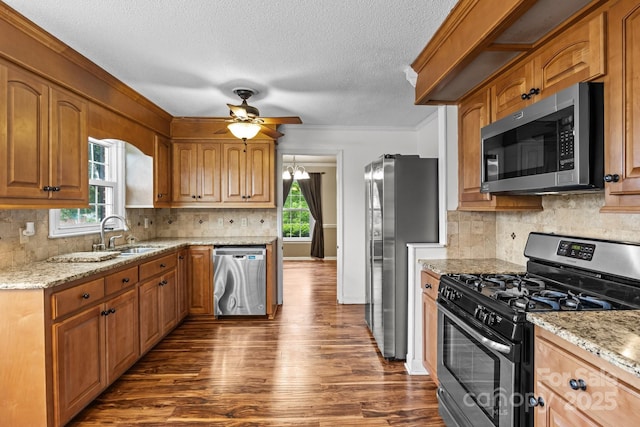 101 Wynnchester Rd, Gastonia, NC 28056 - kitchen with dark wood-style flooring, light stone countertops, ceiling fan, a sink, and appliances with stainless steel finishes