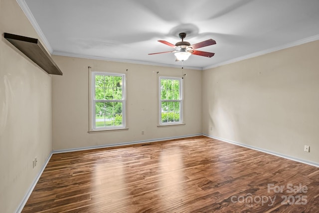 101 Wynnchester Rd, Gastonia, NC 28056 - empty room featuring baseboards, a ceiling fan, wood finished floors, and ornamental molding