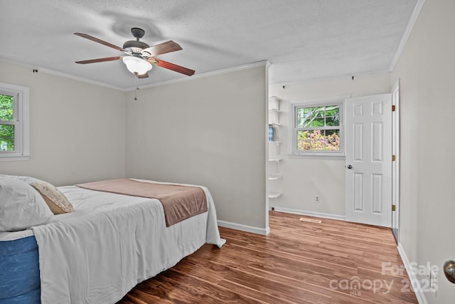 101 Wynnchester Rd, Gastonia, NC 28056 - bedroom featuring baseboards, ornamental molding, and wood finished floors