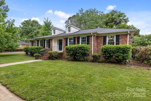 101 Wynnchester Rd, Gastonia, NC 28056 - view of front of property featuring brick siding and a front lawn
